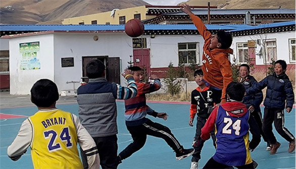 Providing sports kits to children in Tibet